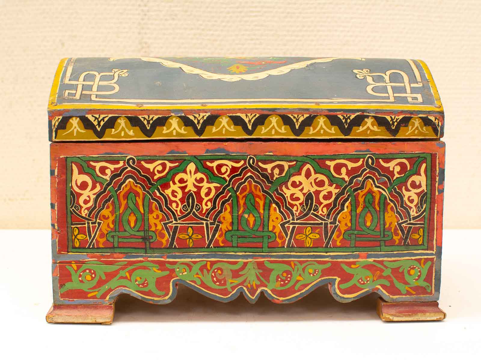 Vibrant decorative box with floral patterns, perfect for stylish storage and cultural artistry.