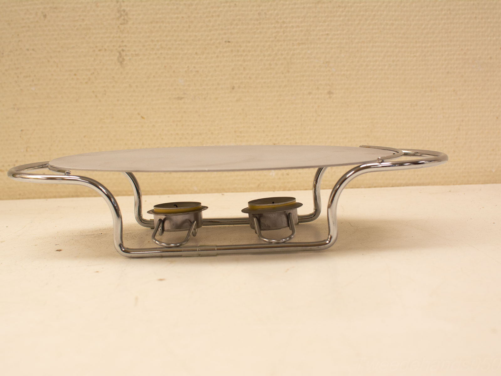 Elegant oval serving tray with candle holders and handles, perfect for serving and decoration.