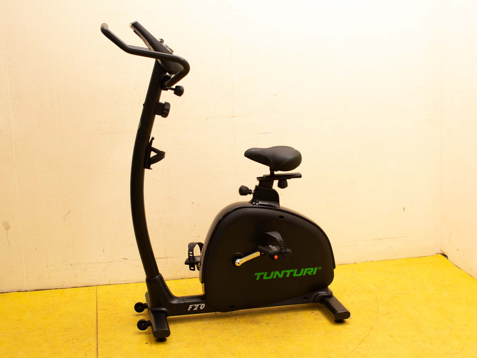 Tunturi exercise bike: sleek, compact design for comfortable home workouts with adjustable resistance.