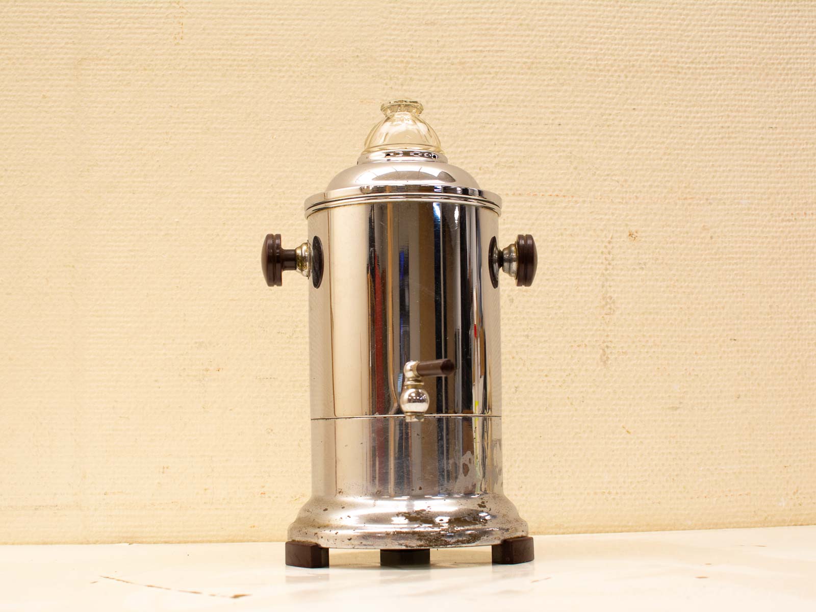 Vintage chrome water dispenser with knobs, ideal for adding nostalgia to any interior.